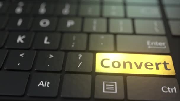 Black computer keyboard and gold convert key. Conceptual 3D animation — Stock Video