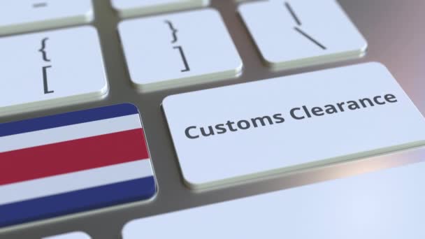 CUSTOMS CLEARANCE текст и флаг Коста-Рики на кнопках на клавиатуре компьютера. Импорт или экспорт концептуальной 3D анимации — стоковое видео