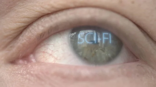 Brillante palabra SCI-FI en ojo humano. Macros relacionados con la biotecnología moderna —  Fotos de Stock