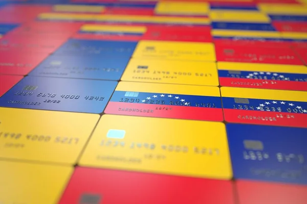 Nationalflagge Venezuelas auf Kreditkarten. Bankenbezogene 3D-Darstellung — Stockfoto