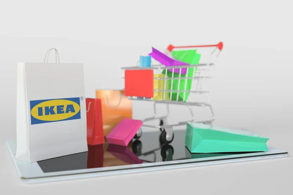 Nákupní košík na tabletu a papírový sáček s logem Ikea. Editorial e-commerce related 3D rendering — Stock fotografie