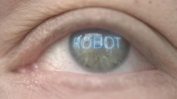 ROBOT szó a szemre. Modern technológiával kapcsolatos makró klip — Stock Fotó