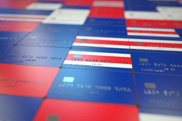 Flag of Costa Rica on plastic bank cards. National banking related 3D rendering — Stock Photo, Image