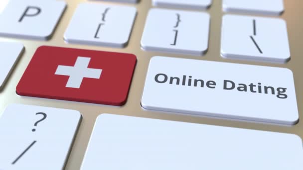 Текст онлайн датування та прапор Швейцарії на клавішних. Концептуальна 3D-анімація — стокове відео