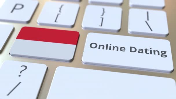 Online Dating Text und Flagge Indonesiens auf der Tastatur. Konzeptionelle 3D-Animation — Stockvideo