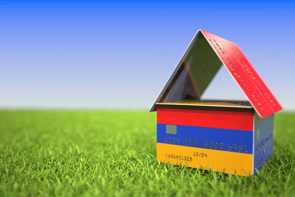 Прапор Вірменії на пластмасових банківських картках у траві. Mortgage пов'язаний 3D рендеринг — стокове фото