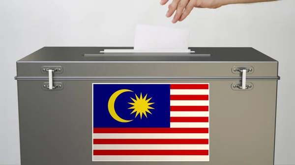 Mão colocando cédula de papel em urna com bandeira da Malásia. Eleição relacionada com a renderização 3d — Fotografia de Stock