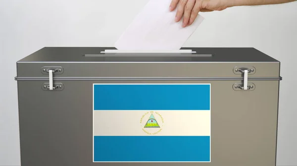 Caixa de cédula com bandeira da Nicarágua, renderização 3d relacionada à eleição — Fotografia de Stock