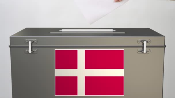 Flag of Denmark on ballot box and hand putting paper ballot — Stock Video