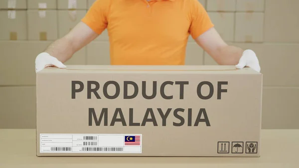 Big box with PRODUCT OF MALAYSIA printed text on the side — Stock Photo, Image