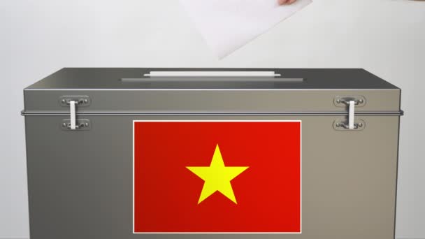 Papírszavazólapok elhelyezése a szavazóurnában Vietnam zászlajával. Szavazással kapcsolatos klipek — Stock videók