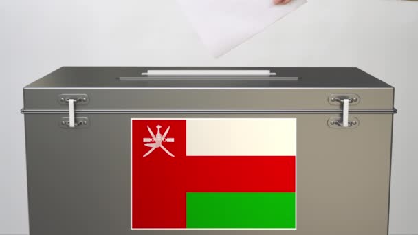 Putting paper ballot into ballot box with flag of Oman. Voting related clip — Stock Video