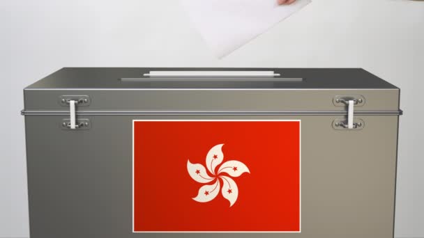 Hand sätta papper röstsedel i valurnan med flagga Hongkong. Valrelaterat klipp — Stockvideo