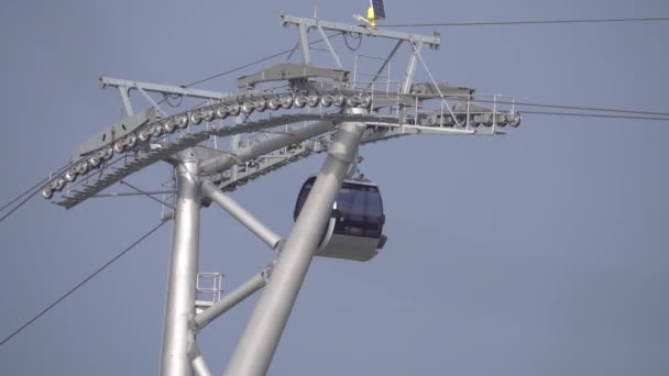 Cable car or aerial lift in action, telephoto lens shot — Stock Video