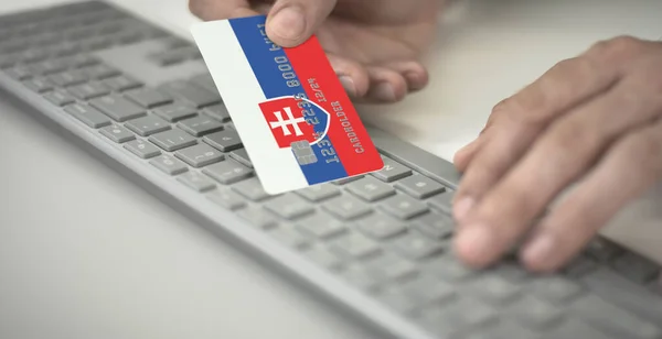 Man pays online with plastic bank card with printed flag of Slovakia. Fictional numbers — Stock Photo, Image