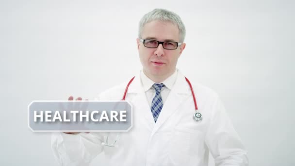 GEZONDHEIDSINDUSTRIE tekst in handen van artsen — Stockvideo