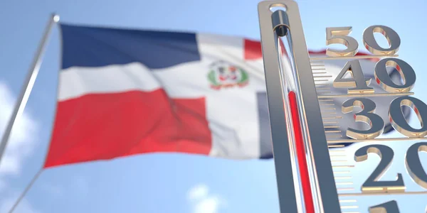 El termómetro muestra alta temperatura del aire contra la bandera borrosa de la República Dominicana. Pronóstico del tiempo caliente relacionado 3D renderizado —  Fotos de Stock