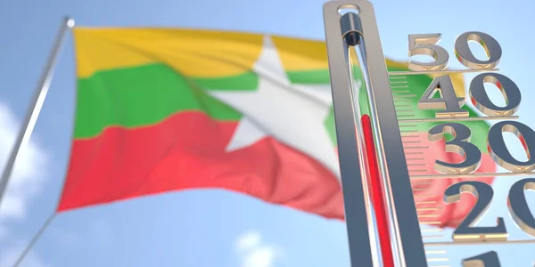 Il termometro mostra un'alta temperatura dell'aria contro la bandiera sfocata del Myanmar. Previsioni meteo calde relative rendering 3D — Foto Stock