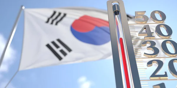 Teploměr ukazuje vysokou teplotu vzduchu proti rozmazané vlajce Jižní Koreje. 3D vykreslování související s předpovědí horkého počasí — Stock fotografie