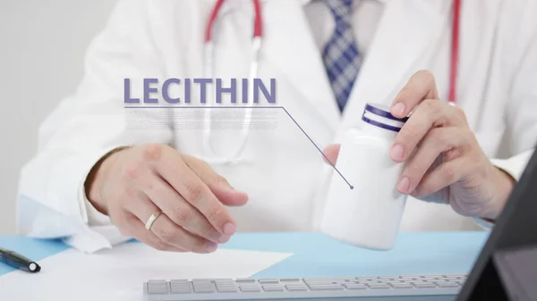 LECITHIN, ένα γενικό συμπλήρωμα, στο μπουκάλι στο χέρι γιατρούς — Φωτογραφία Αρχείου