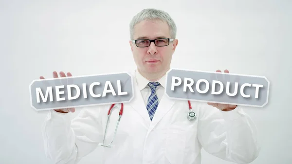 Doutor detém texto MEDICAL PRODUCT em suas mãos — Fotografia de Stock