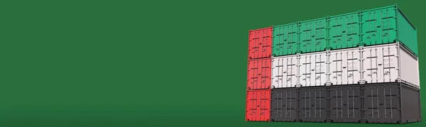 Грузовые контейнеры составляют флаг ОАЭ на зеленом фоне, 3D рендеринг — стоковое фото