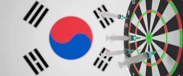 Mehrere Spritzen mit einem Impfstoff auf dem Hintergrund der koreanischen Flagge. Medizinische Forschung und Impfungen in Südkorea, 3D-Darstellung — Stockfoto