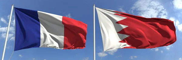 Bandeiras da França e do Bahrein em postes de bandeira. Renderização 3d — Fotografia de Stock