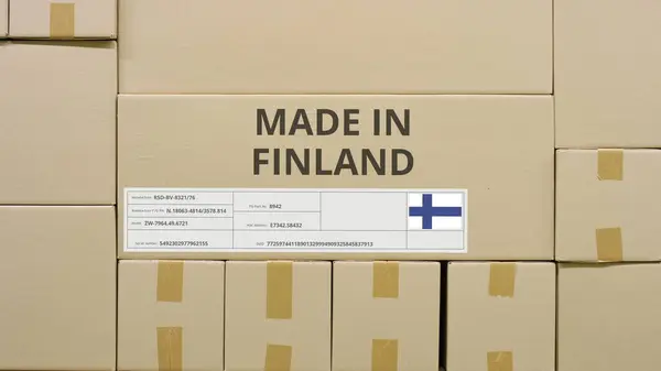 Cartón con texto impreso MADE IN FINLAND y bandera. Concepto logístico almacén —  Fotos de Stock