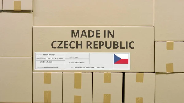 MADE IN CZECH REPUBLIC text and flag label on the carton in a storage — Stock Photo, Image