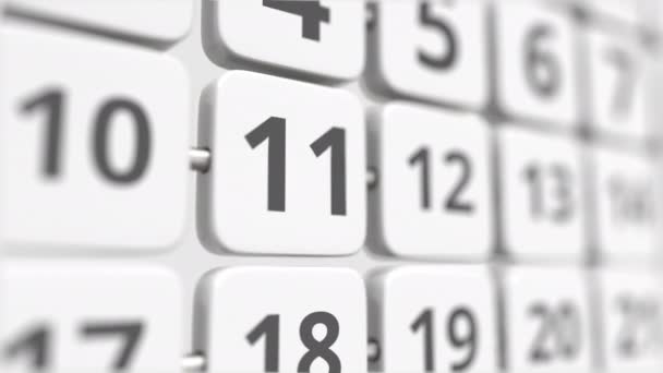 11 fecha en la placa del calendario de giro. Plazo o concepto de planificación empresarial — Vídeo de stock