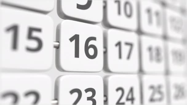 回転カレンダープレート上の16日。締切又は事業計画の概念 — ストック動画