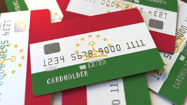 Mnoho kreditních karet s vlajkou Tádžikistánu. 3D vykreslování — Stock fotografie