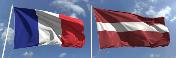 Sventolando bandiere di Francia e Lettonia sui pali della bandiera, rendering 3d — Foto Stock