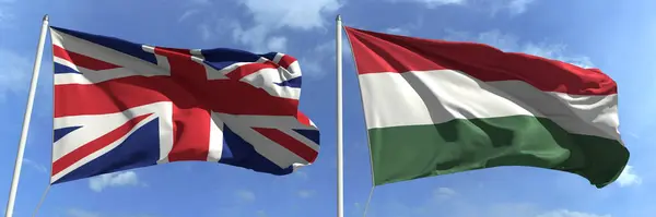 Waving flags of Great Britain and Hungary on flagpoles, 3d rendering — Stock Photo, Image