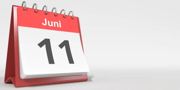 11 июня дата написана на немецком языке на странице календаря переворачивания. 3d-рендеринг — стоковое фото