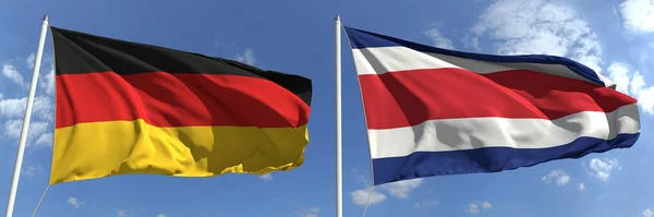 Banderas ondeando de Alemania y Costa Rica en asta de bandera, 3d renderizado — Foto de Stock