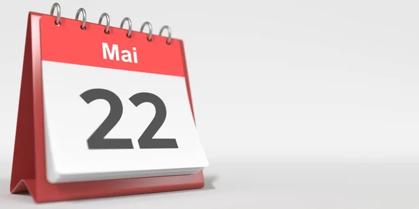 ドイツ語で書かれた5月22日の日付が反転カレンダーページに表示されます。3Dレンダリング — ストック写真