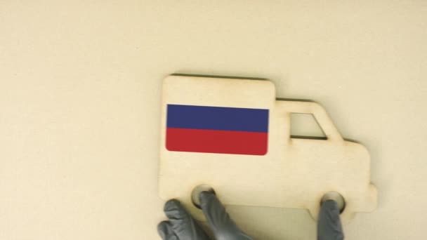 俄罗斯国旗在回收纸板箱上的图标，国家可持续物流概念 — 图库视频影像