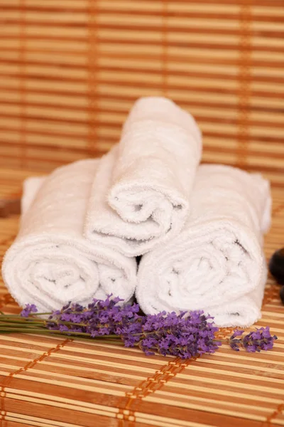 White Towels Massage Rocks Spa Salon Dark Light Bamboo Background — Stock Photo, Image