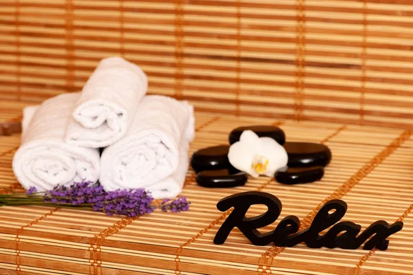 White Towels Massage Rocks Spa Salon Dark Light Bamboo Background — Stock Photo, Image