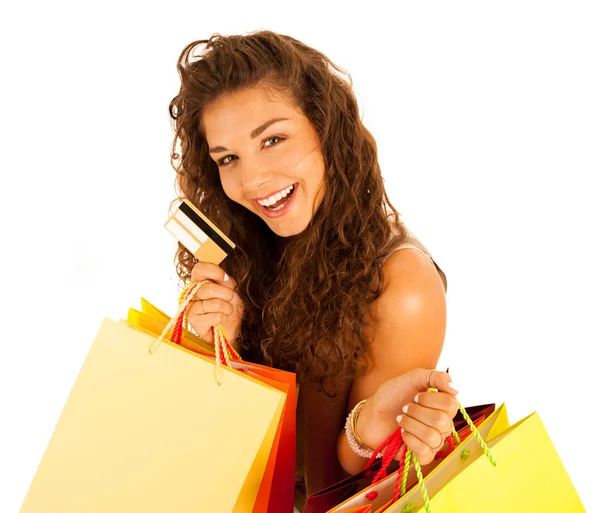 Attractive young caucasian woman with shopping bags isolated ove — Stock Photo, Image