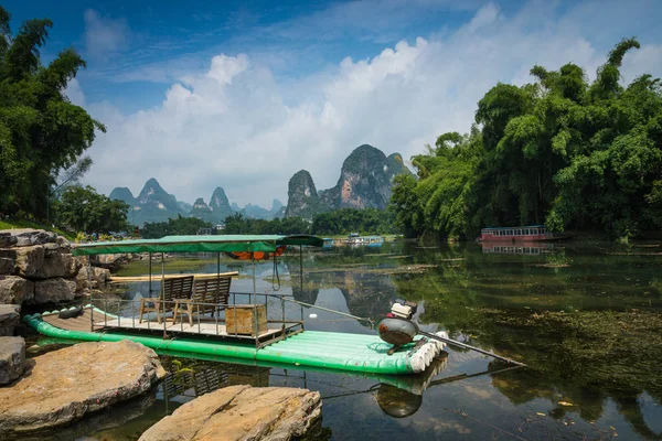 Li River (Lijiang River). Pleasure boats at the pier in Xingping Town