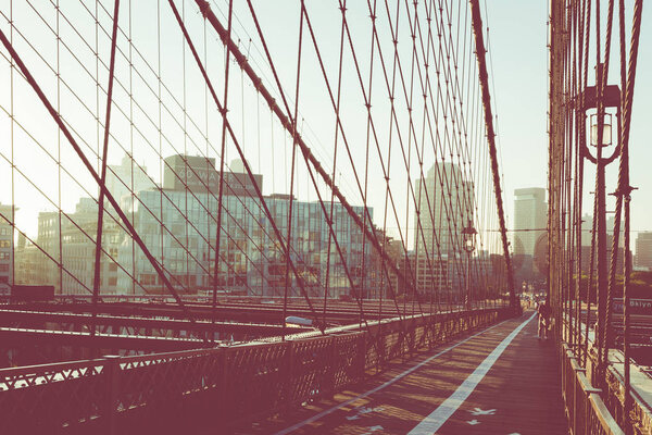 Vintage Color View of Brooklyn Bridge with Detail of Girders and Support Cables, Manhattan City Skyline at Sunrise, New York City, New York, USA