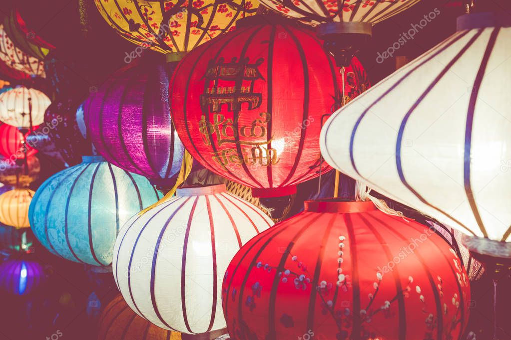 Colorful lanterns spread light on the old street of Hoi An Ancie