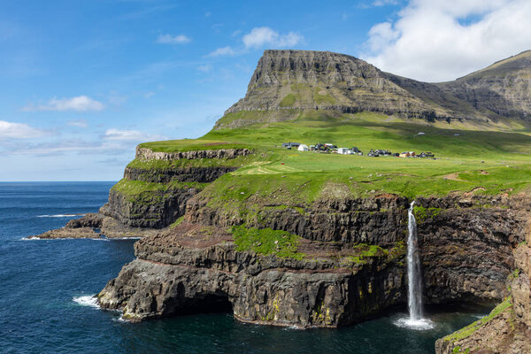 Mulafossur waterfall in Gasadalur village in Faroe Islands, Nort