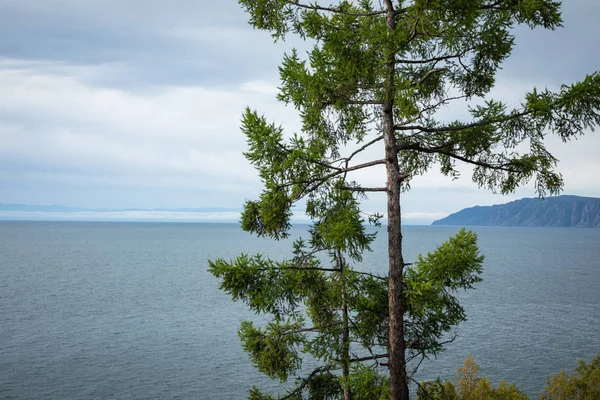 Angara river at lake Baikal in Listvyanka village. Summer landsc