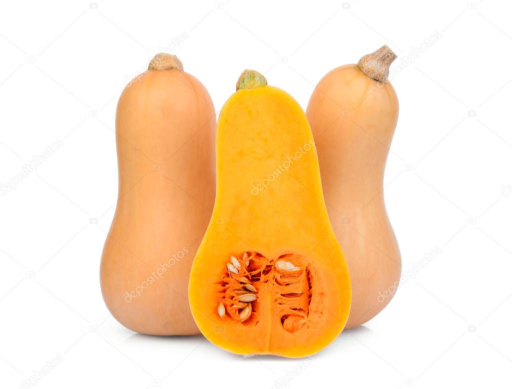 two whole and half butternut squash isolated on white background