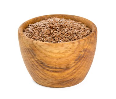 ahşap bir kasede beyaz izole keten tohumu