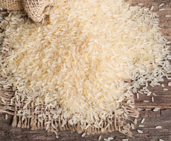 Arroz Parboilizado Superfície Madeira — Fotografia de Stock